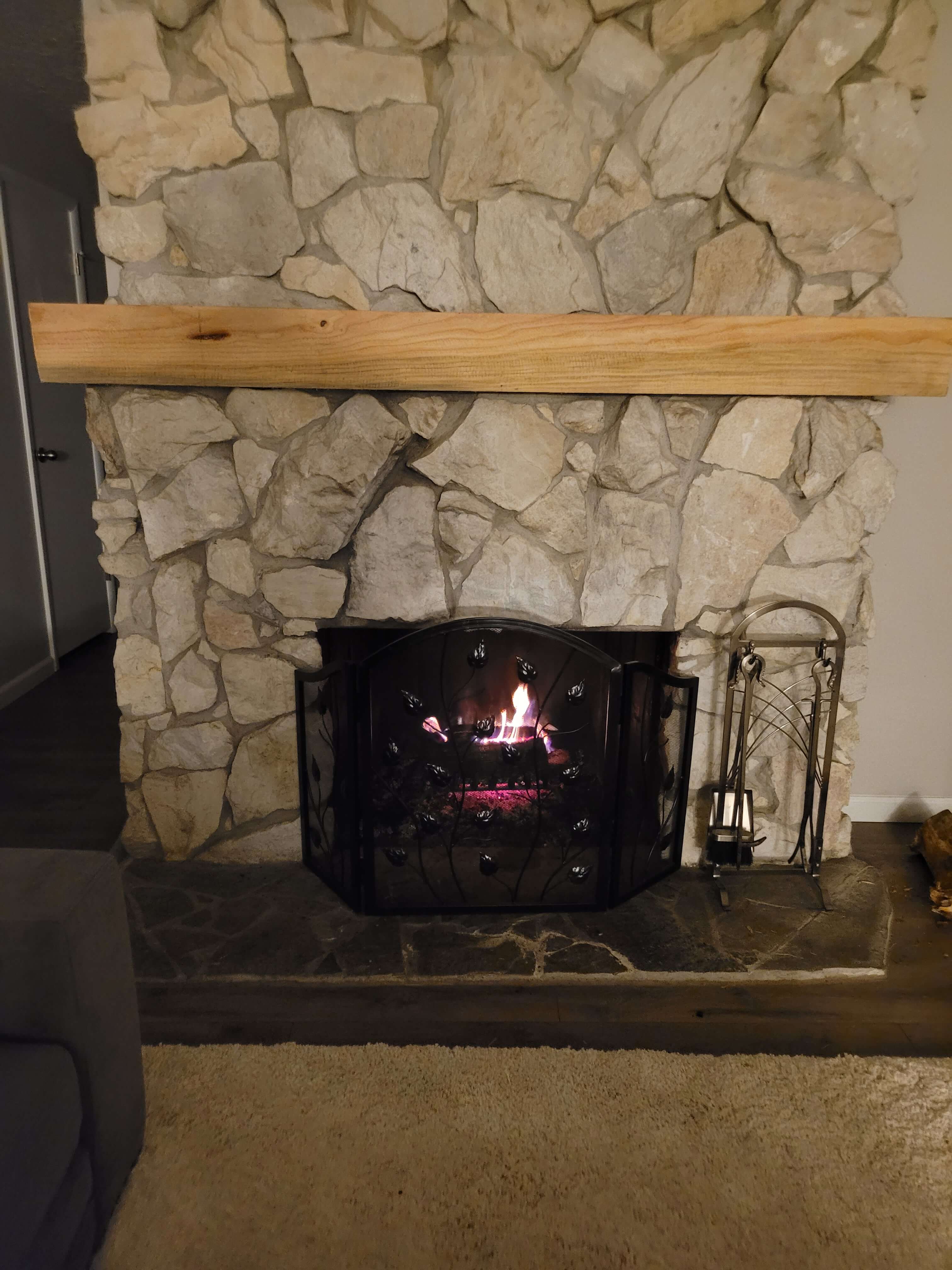 Fir slab used as a fireplace mantel